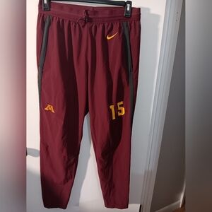 Nike Burgundy Dri-FIT Athletic Top withYellow Swoosh